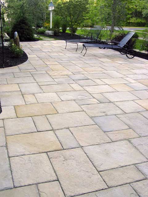 pavers that have a large range in size create traditional patio