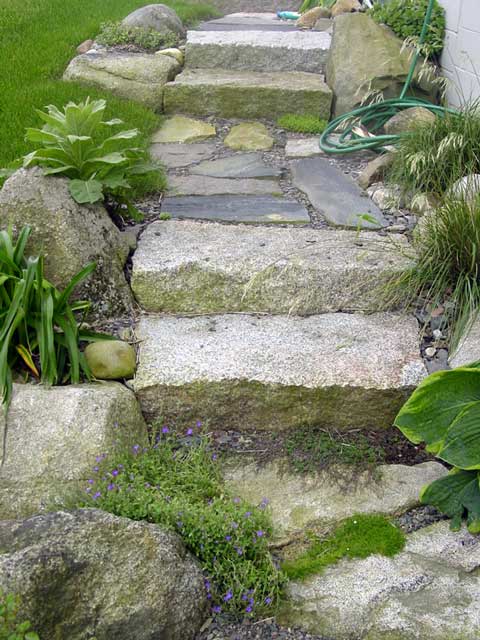 stone steps lead through a rock garden