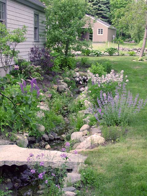 natural blues and purples create a soft landscape with stone bridge