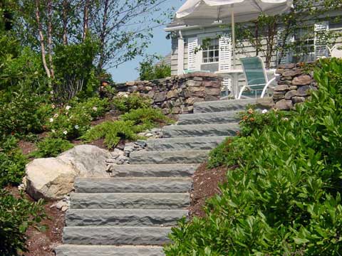 these stone steps create a statement and traverse a steep incline