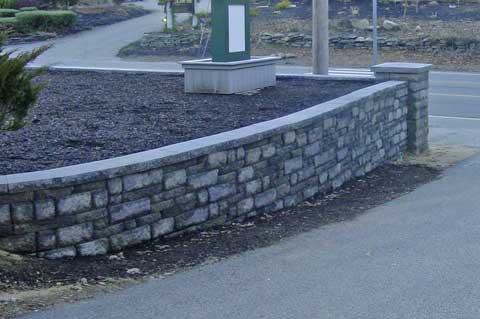 commerical block wall beside driveway