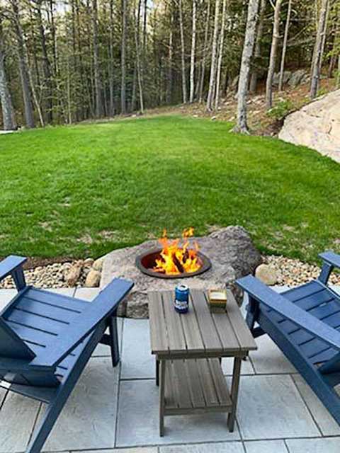 fire pit design that overlooks the lawn