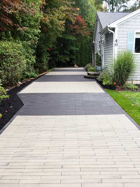 paver driveway in light tone by Gogan Landscaping