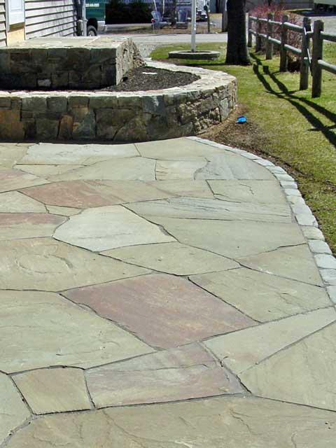 fitted stone create patio with finished edge