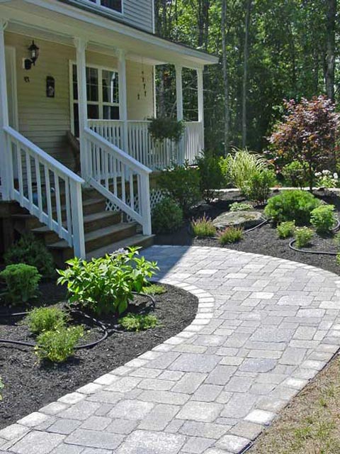 a formal entry walkway with pavers